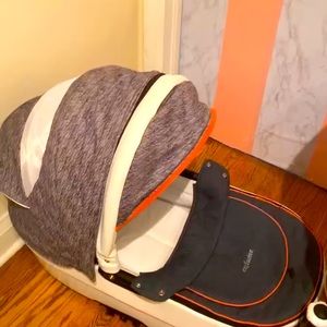 Exclusive Red, white and blue Stroller with bassinet.